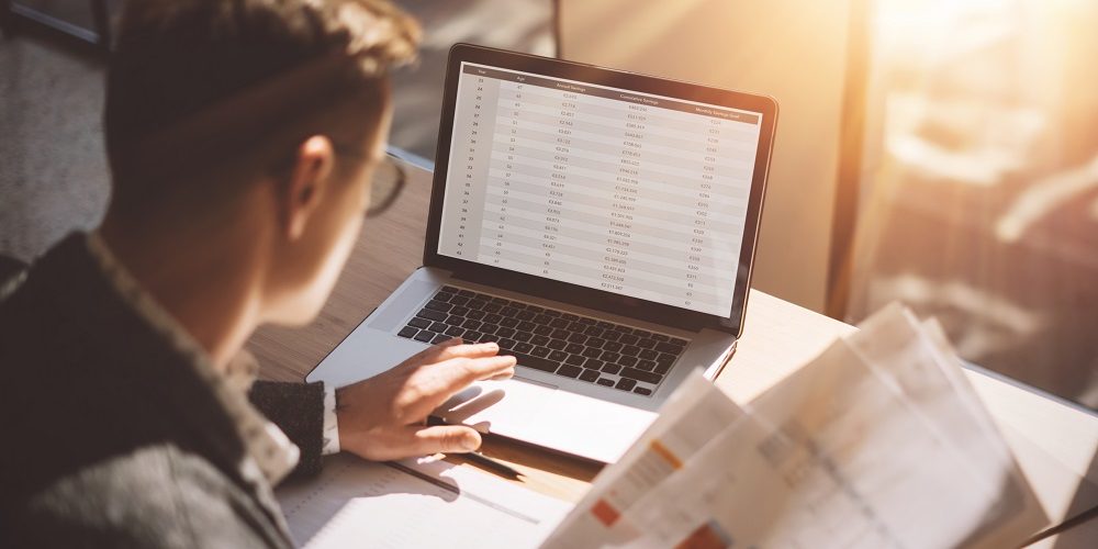 Employee looking at God-honoring 401(k) paperwork