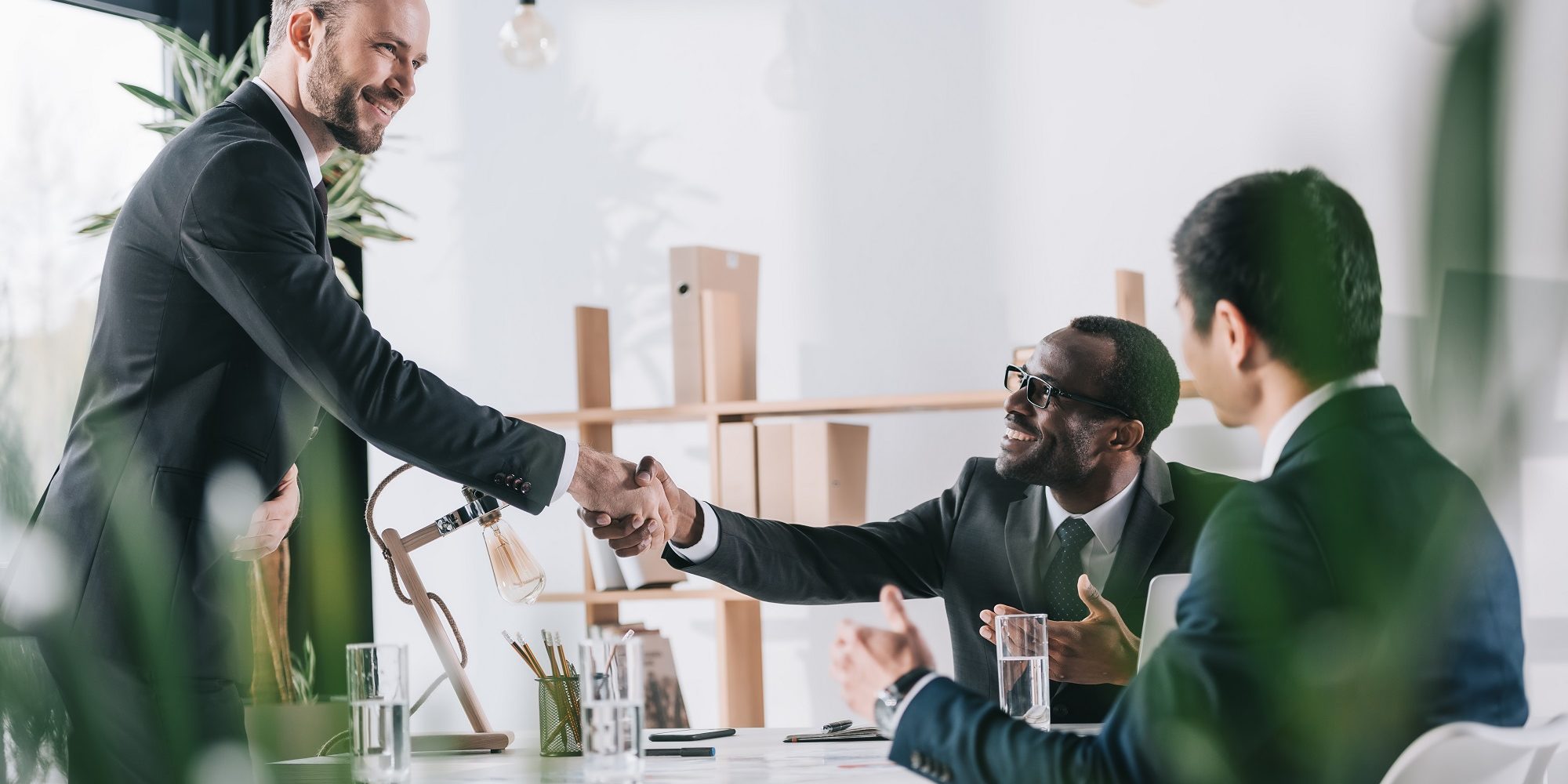 Christian financial advisors shaking hands