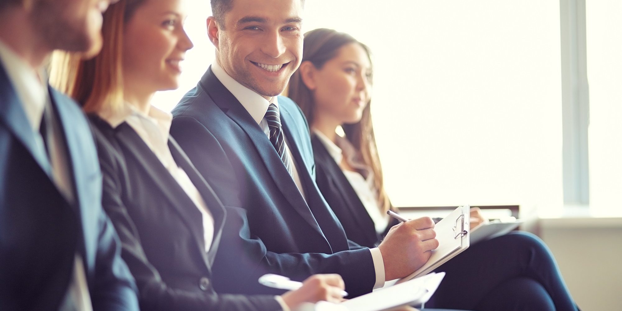 Happy employees in meeting